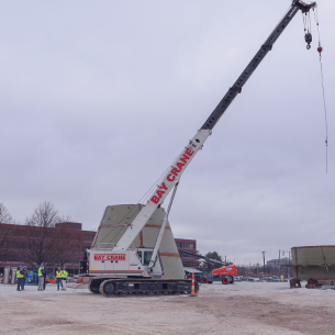 Crane lifting equipment at a construction site for the South Water Tower project