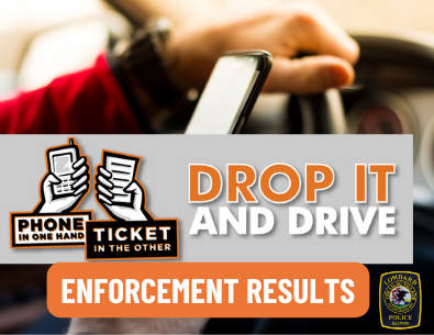 hand on wheel with other phone holding cell phone