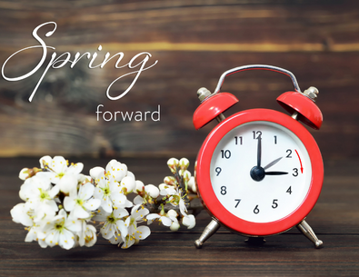 illustrated clock with pink flowers and green grass background 