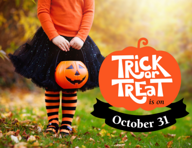 purple background with orange pumpkins and trick or treat text 