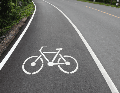 Bicycle graphic painted on bicycle lane 